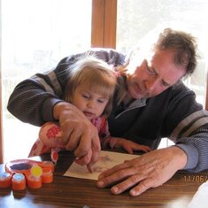 Papa Marty and Bella finger painting 2010