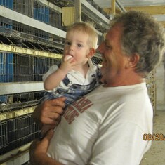 Papa Marty showing Evan how to gather eggs
2011