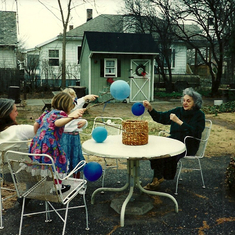 Mary Alice, Rachel, Sophia, and Mary playing in the backyard