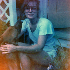 1977, 12, Mary with Linda Cox's dog Sam, on the Terrace
