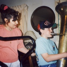 1995, 6, Mary Hsia giving Mike Cox tuba lesson on Ivan Hill Terrace, Los Angeles