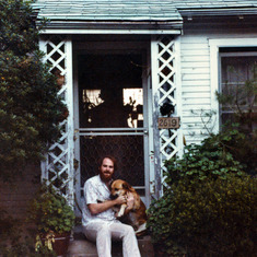 1980, 1, Larry Cox and Sam the dog in the cottage Linda used to live in on the terrace, then Mary lived there