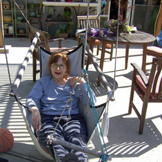 2008, 3, Mary in chair in backyard
