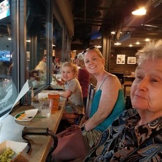 Isabelle, Cori and Grandma Mary at Round Rock Express Game sitting in the VIP lounge.