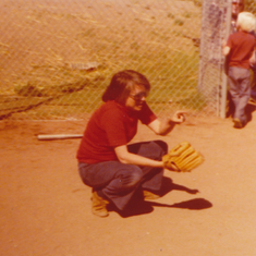 Mom as the ballplayer...always jumped into play with the kids.