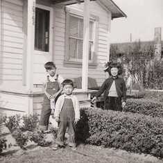Mas, George and Michie in front of their new house in Stanton, CA
