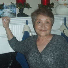My mom at our house...Christmas 2007. Beautiful picture!