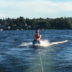 Kne boarding on a foam surf board in Lake Washington...