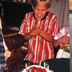 This is one of my favorite pictures of Matty!  He lived life with the same excitement he showed toward his cake that day!!!!  He could not wait to dig in.....Big Hugs Aunt Tammy