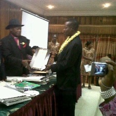 Pastor Kenny receiving Certificate of induction as a Fellow of the Chartered Board of Administrators of Nigeria (FCBA)