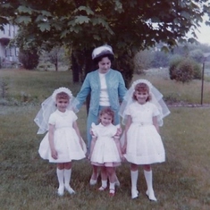 Mine and Jeannie's First Holy Communion.  She always made sure we attended Church.