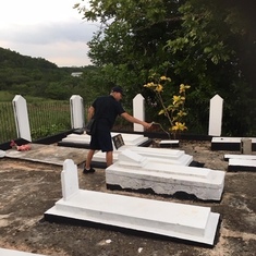 Cousin Steve tending to the Witter family graveyard in Nain, St Elizabeth, Jamaica 2019.