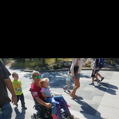 Ryleigh catching a ride at Mount Rushmore with her Auntie!