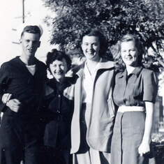 Megan with brother Bill, sister Alice, and mother.