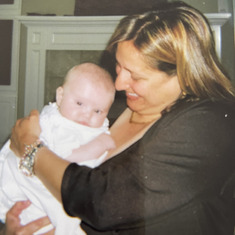Mel holding Sara Kay at her baptism party  3/2007