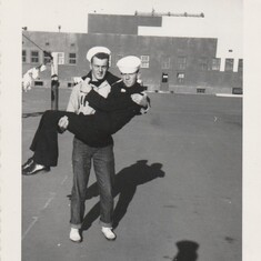 dad messing around with his buddy in navy