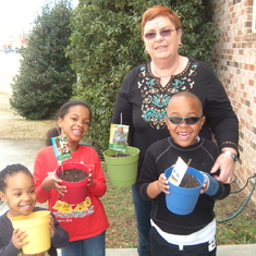 Mummy and her grandkids during her last visit! - They planted flowers