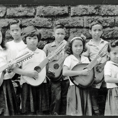 Merlinda (seen on the right) was one of the youngest members of her Banduria Choir