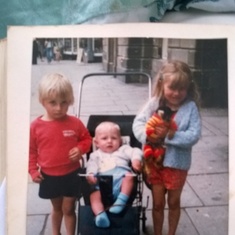 Michael, Jamie & Laura. Michael not happy that Laura is holding the monkey. 1985