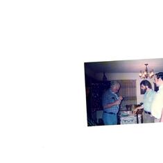 Dad tying a tie, Mike & Konrad 12-24-1986