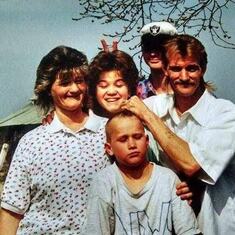 heres when we had mom and dad  and our baby brother all toghether  .when were once what u call a real  family its sad u gone though miss u big brother
