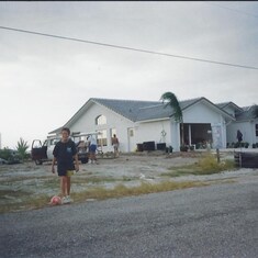 Michael - 1991 At our parents' house; checking out the progress, patiently awaiting completion so we could move in.
