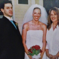 Michael with his sisters, Michele (center) and Marta (right) at Michele's wedding (March 2006)
