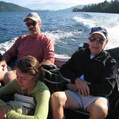 Mike with his father cruising on Lake George, Nathan's wife Melissa sitting.