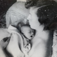 Mike and his mom when he was 13 days old 