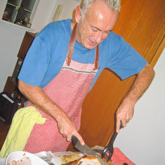 Michael was a master at Thanksgiving. Here, he's carving a turkey in Hong Kong in 2004.
