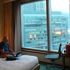 Michael checking email at my hotel on Lantau island