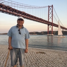 Lisbon, September 2017. Dad requested to take this portrait with the photo background with the bridge and sailing boat. 