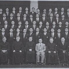 Class of 1957 graduation, St. Louis School (4th row, 1st from the right)