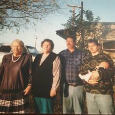 Lucille Hardin, Joyce Qualls, Michael Qualls Sr. and Mikey holding Ashley.