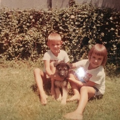 Mike and I holding our very first dog.