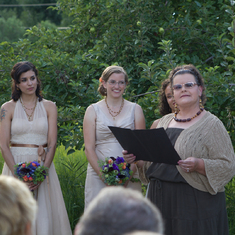 Mira reading a poem at Jessie May's wedding.