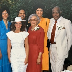 Bill's family gathers around Miranda for the wedding day photo