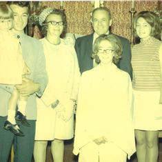 Gary was holding Sonya, mom and daddy. Golda and Sharon was standing in front of daddy at Muhlenberg Lutheran Church