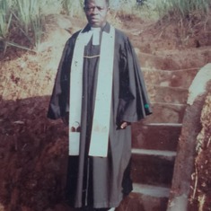 Papa David Chembe Asana on stairs leading to his house from Ministering in Nchum - Bafut