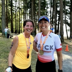 Monica and I at the finish line of the Elk Lake triathlon, Aug 2019, a mere 7 months post-stroke.