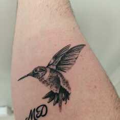 A tattoo of a hummingbird (Monica's spirit animal) I had done to commemorate the woman I loved so.