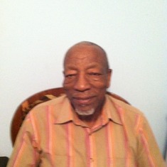 Daddy sitting in his favorite chair at home. Always smiling.