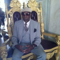 At the Holy Land Attraction..Sitting in a kingly looking chair