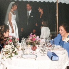Myriam in 1999 at Kristina's wedding in Orange Virginia talking with Betsy Kennedy, maid of honor.