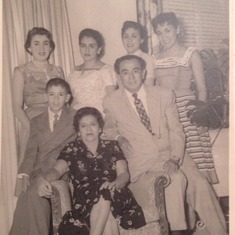 Myriam with her parents sisters and brother Tito.  Myriam is on far right.