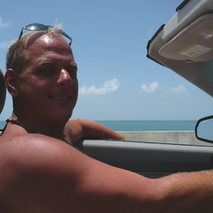 Myron driving the little blue Convertible Eclipse I'd rented for our travels in Florida 2008.  We are heading down to Key West.
