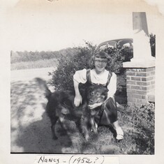 Nancy 1952- She always loved dogs!