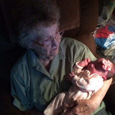 Mom holding great-grandbaby Leah. October 2014.