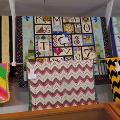 Mom's afghan (lower center) at the Monroe County Fair.