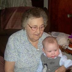 Mom holding Lauri's baby, Braden.